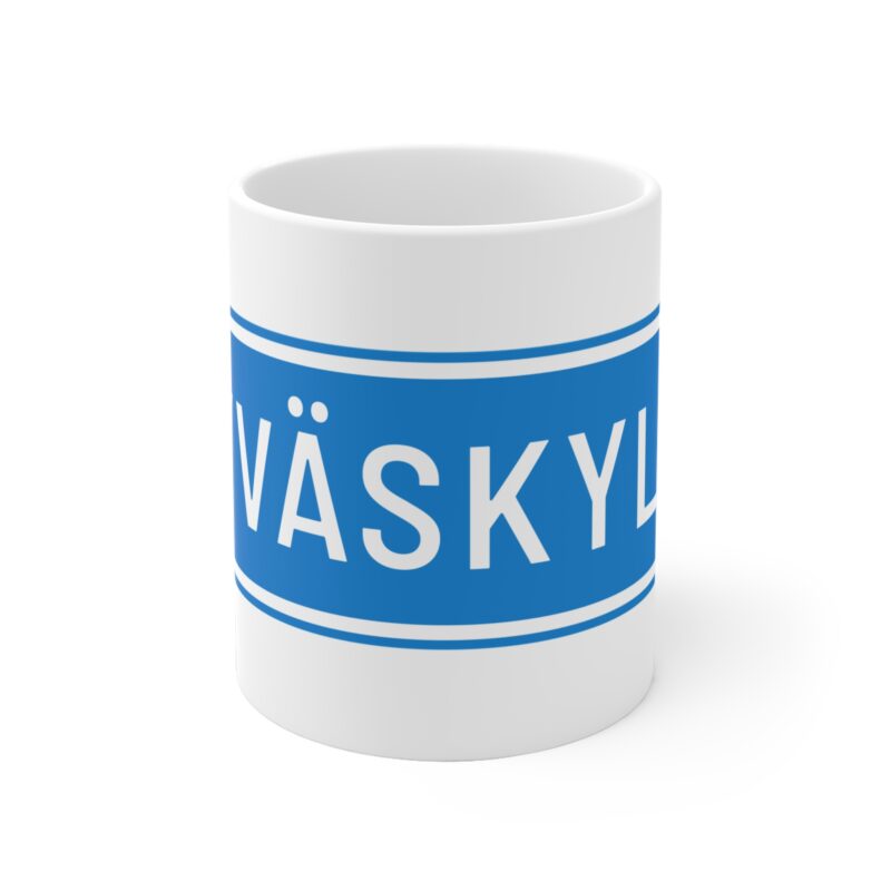 Ceramic coffee mug with minimalist blue and white directional sign reading “Jyväskylä”