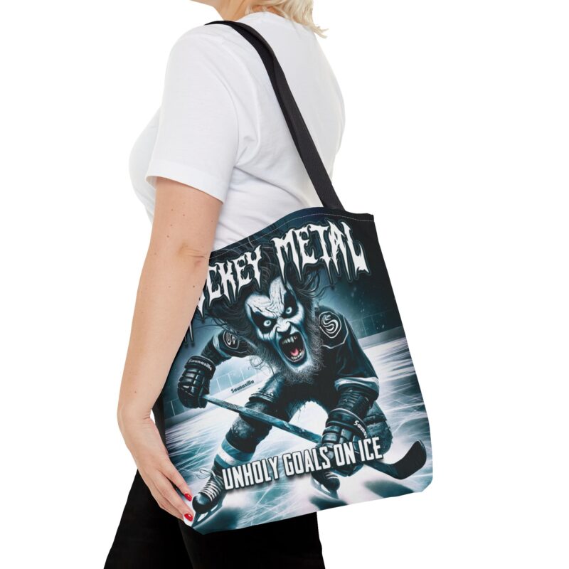 Printed tote bag featuring skulls, pucks, and icy chaos under the bold text “Hockey Metal”