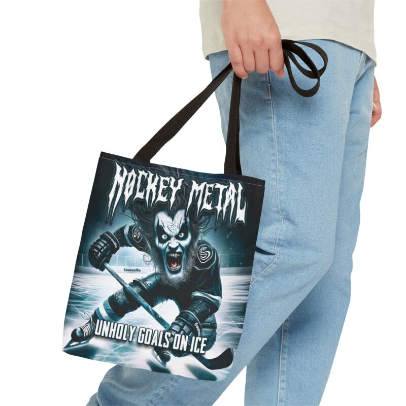 Waterproof tote with dark, intense graphics – hockey sticks, chains, and screaming fans