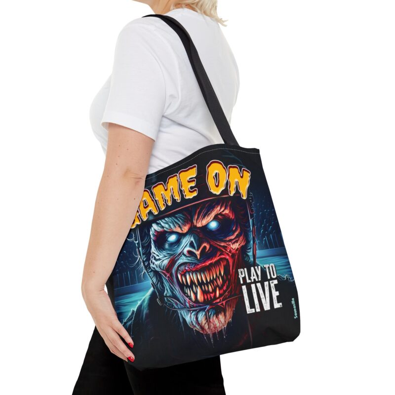 Printed tote bag featuring dynamic motion graphics and the slogan “Play To Live” for gamers or athletes
