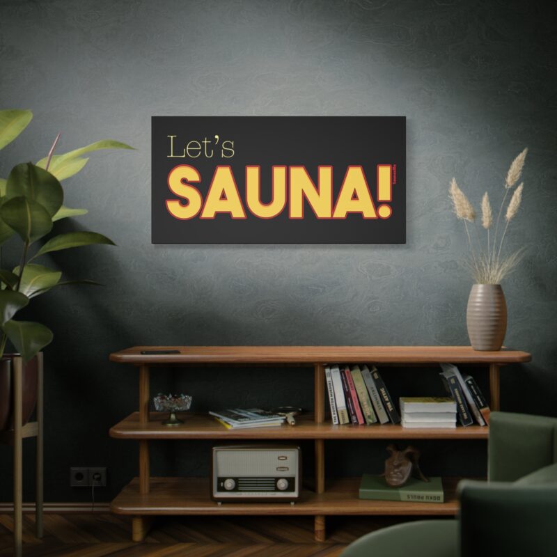 Stretched canvas print with bold, playful text “Let’s Sauna!” surrounded by rising steam