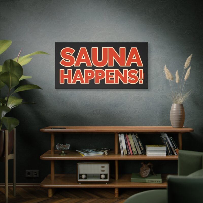 Funny wall art featuring the phrase “Sauna Happens!” in a cheeky, upbeat font style