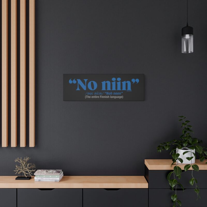 Funny wall art with minimalist black text: “No Niin,” a nod to Finnish cultural understatement